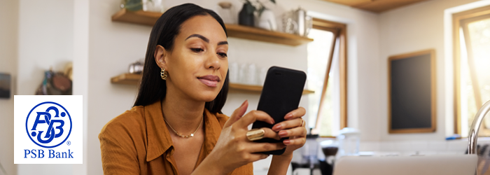 Woman at home using her smartphone
