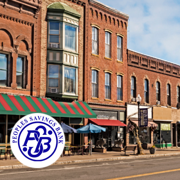 Row of brick businesses and street
