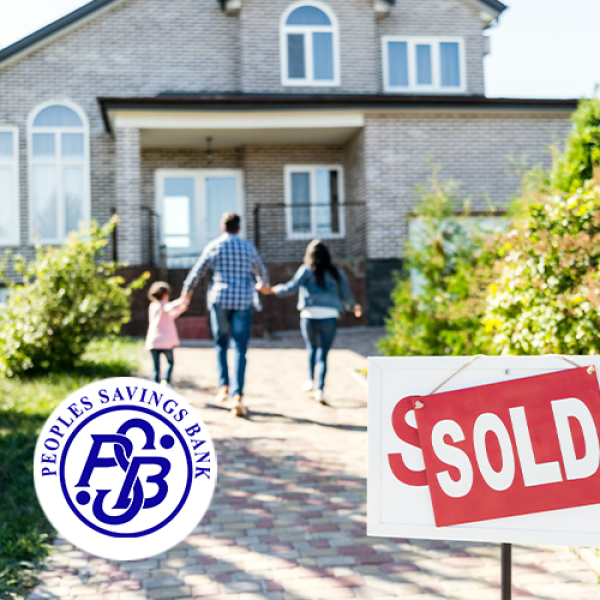 Sold sign hanging over for sale sign as family holds hands and runs toward house in the background